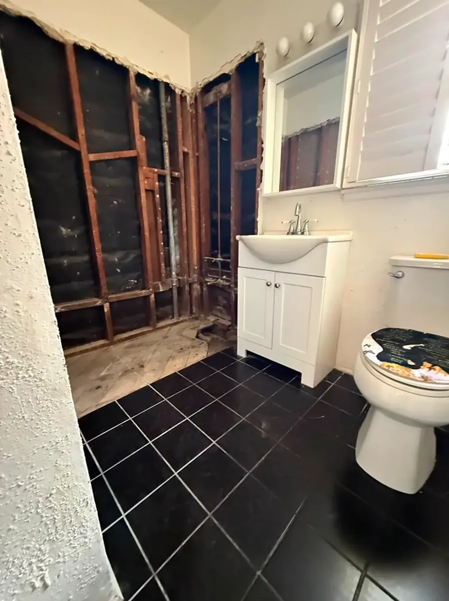 Tub Removed — Walk-In Shower Conversion before